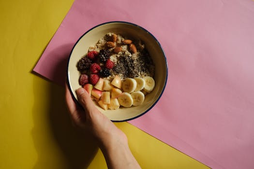 colorful bowl of breakfast oatmeal with berries